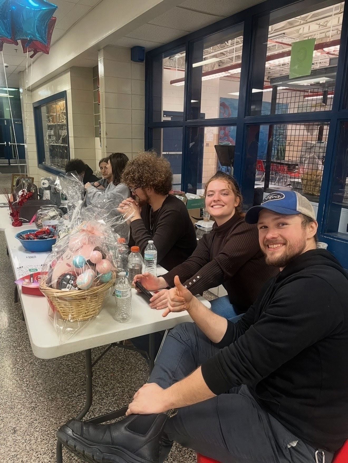 Jock Sutherland Classic players and supporters at a table
